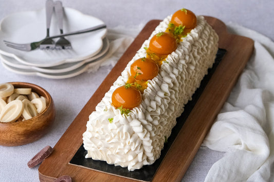 Bûche vegan noix de coco, mangue, cardamome, citron