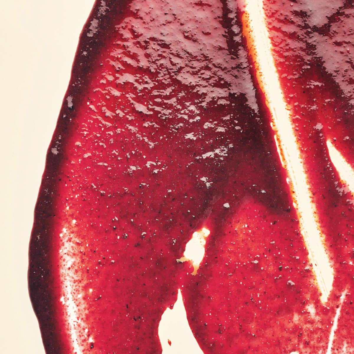 zoom sur la texture d'une purée de cassis comestible
