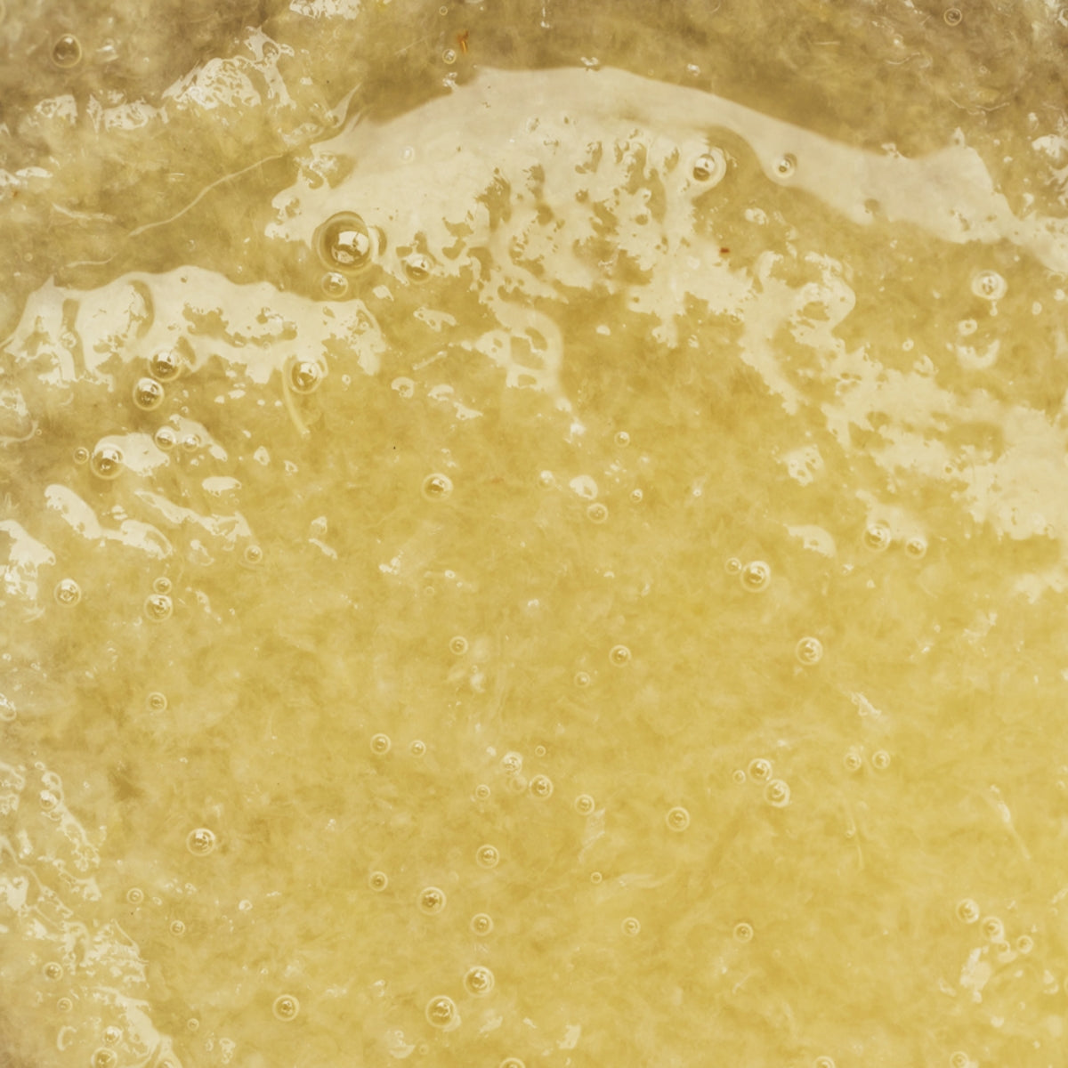 zoom sur texture d'une purée de fruit au citron adamance
